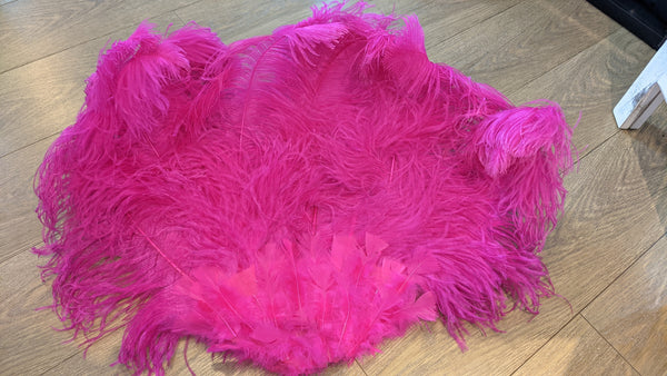 Magenta feather hand held fan